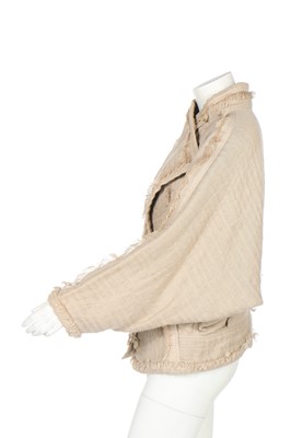 Lot 220 - An Issey Miyake puckered cotton jacket with frayed edging, early 1980s