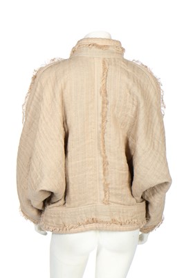 Lot 220 - An Issey Miyake puckered cotton jacket with frayed edging, early 1980s
