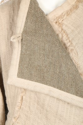 Lot 220 - An Issey Miyake puckered cotton jacket with frayed edging, early 1980s