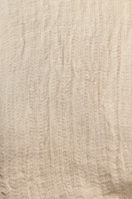 Lot 220 - An Issey Miyake puckered cotton jacket with frayed edging, early 1980s
