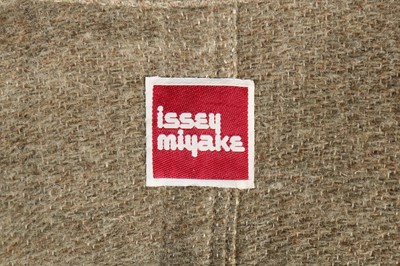 Lot 220 - An Issey Miyake puckered cotton jacket with frayed edging, early 1980s