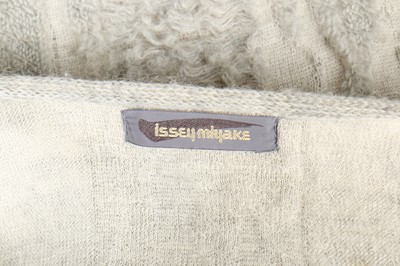 Lot 219 - A good Issey Miyake textured ivory and grey wool coat, 1983