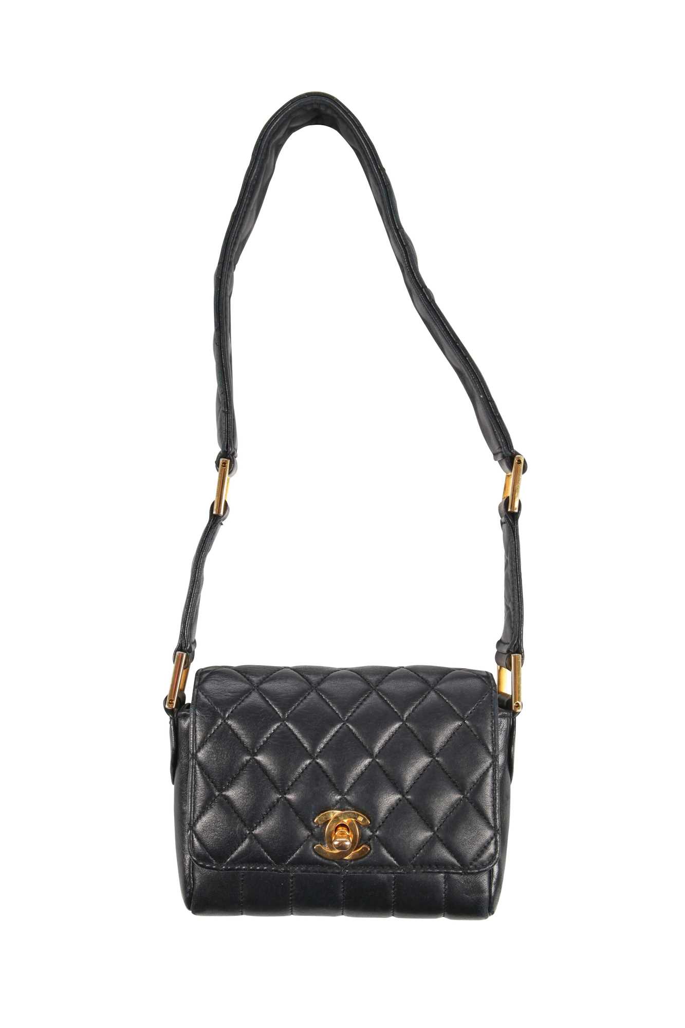 Sold at Auction: A Chanel navy quilted lambskin leather flap bag, 1980s