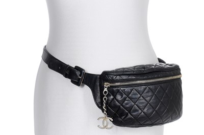 Lot 66 - A Chanel quilted navy lambskin leather bumbag, late 1980s-early 1990s