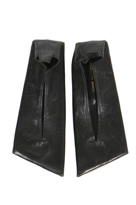 Lot 224 - A pair of Comme des Garçons 'flat' black leather shoes, circa 1985