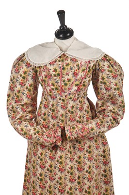 Lot 219 - A good printed chintz dress and lawn chemisette, circa 1825