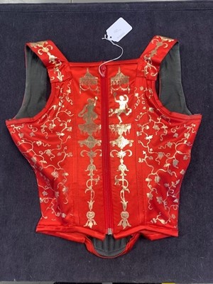 Lot 180 - A good Vivienne Westwood gold-stencilled red satin corset, probably 'Salon' collection, Spring-Summer 1992