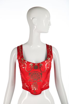 Lot 180 - A good Vivienne Westwood gold-stencilled red satin corset, probably 'Salon' collection, Spring-Summer 1992