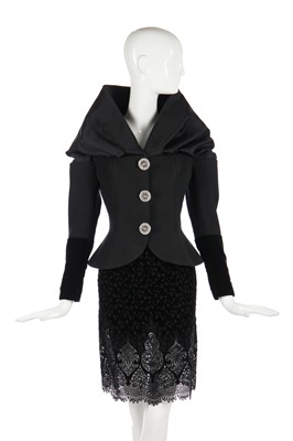Lot 185 - A Christian Lacroix couture black wool and velvet suit, early 1990s