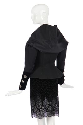 Lot 185 - A Christian Lacroix couture black wool and velvet suit, early 1990s