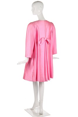 Lot 175 - A Scaasi bubblegum-pink raw-silk tent-coat, 1980s in a 1960s style