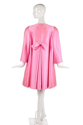 Lot 175 - A Scaasi bubblegum-pink raw-silk tent-coat, 1980s in a 1960s style