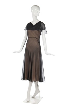 Lot 261 - A rare Madeleine Vionnet couture black chiffon evening dress, model no. 9018, Spring-Summer 1933
