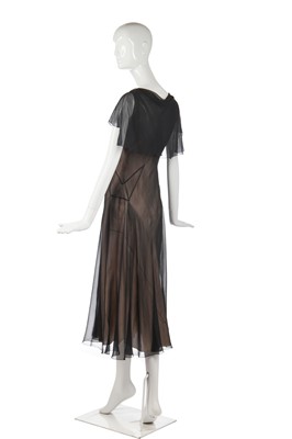 Lot 261 - A rare Madeleine Vionnet couture black chiffon evening dress, model no. 9018, Spring-Summer 1933