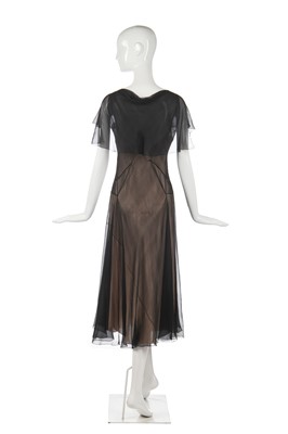 Lot 261 - A rare Madeleine Vionnet couture black chiffon evening dress, model no. 9018, Spring-Summer 1933