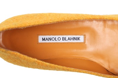 Lot 87 - A pair of Manolo Blahnik yellow tweed flats with rhinestone-encrusted buckles, modern