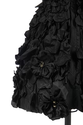 Lot 235 - An early Hubert de Givenchy black paper taffeta cocktail dress, circa 1952