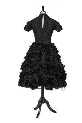 Lot 277 - An early Hubert de Givenchy black paper taffeta cocktail dress, circa 1952