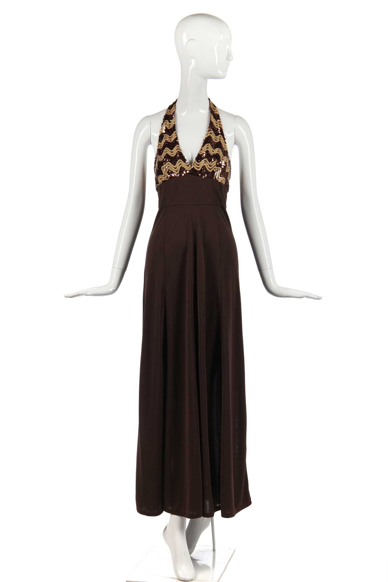 Lot 327 - Nina Baden-Semper's brown jersey dress with zig-zagged sequined halterneck bodice, 1970s