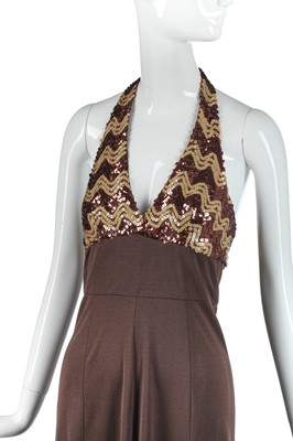 Lot 327 - Nina Baden-Semper's brown jersey dress with zig-zagged sequined halterneck bodice, 1970s