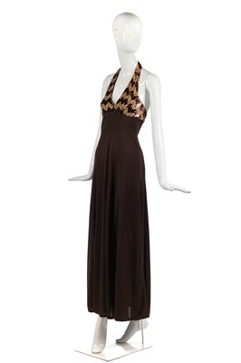 Lot 327 - Nina Baden-Semper's brown jersey dress with zig-zagged sequined halterneck bodice, 1970s