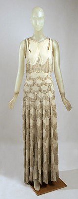 Lot 269 - A rare Madeleine Vionnet couture fringed crêpe evening gown, April 1938