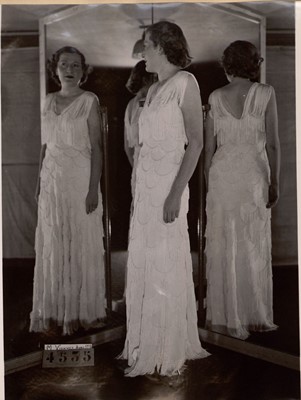 Lot 269 - A rare Madeleine Vionnet couture fringed crêpe evening gown, April 1938