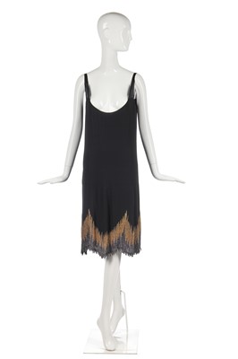 Lot 242 - A Chanel couture beaded black georgette under-dress, 1926-28