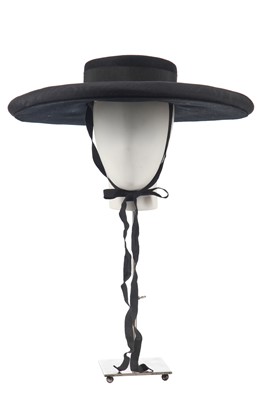 Lot 402 - An Yves Saint Laurent Cordobés-inspired black felt hat, Spring-Summer 1990