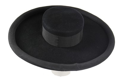 Lot 402 - An Yves Saint Laurent Cordobés-inspired black felt hat, Spring-Summer 1990