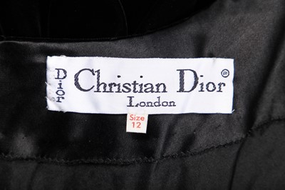 Lot 299 - A Christian Dior London black velvet evening gown, early 1970s