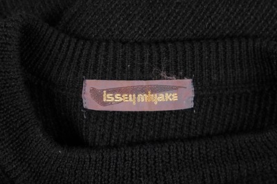Lot 340 - An Issey Miyake knitted black wool dress, Autumn-Winter 1989-90
