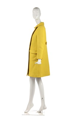 Lot 301 - A Courrèges lemon-yellow wool double-breasted coat, circa 1967