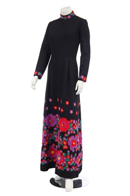 Lot 316 - A floral embroidered A-line black wool gown, early 1970s