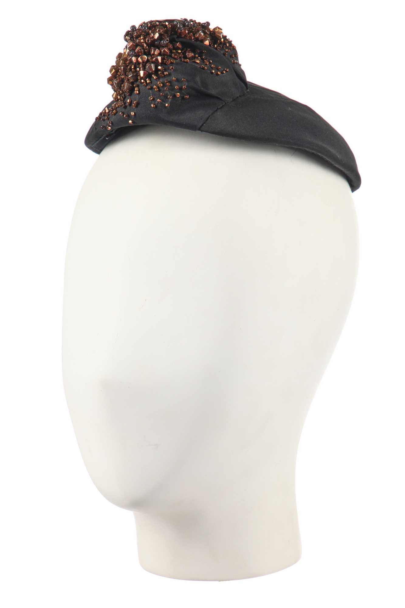 Lot 278 - A Balenciaga black silk faille toque, circa