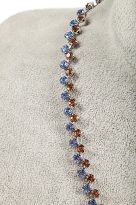 Lot 47 - A Dior necklace of faceted sky-blue and smoky glass cut-brilliants, 1961