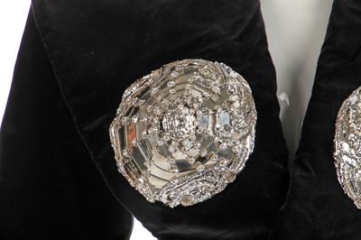 Lot 438 - A Daniel Roseberry for Schiaparelli couture black velvet jacket/dress, Autumn-Winter 2021-22
