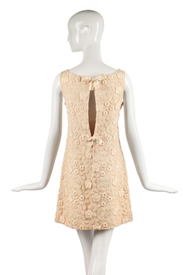 Lot 300 - An early Courrèges couture embroidered ivory tulle minidress, 1964