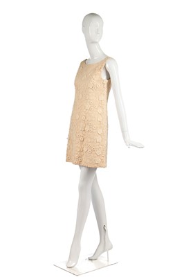 Lot 300 - An early Courrèges couture embroidered ivory tulle minidress, 1964