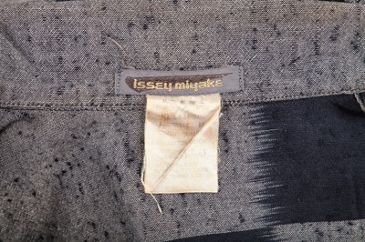 Lot 342 - An Issey Miyake cotton ensemble in shades of blue-black and grey, circa 1985