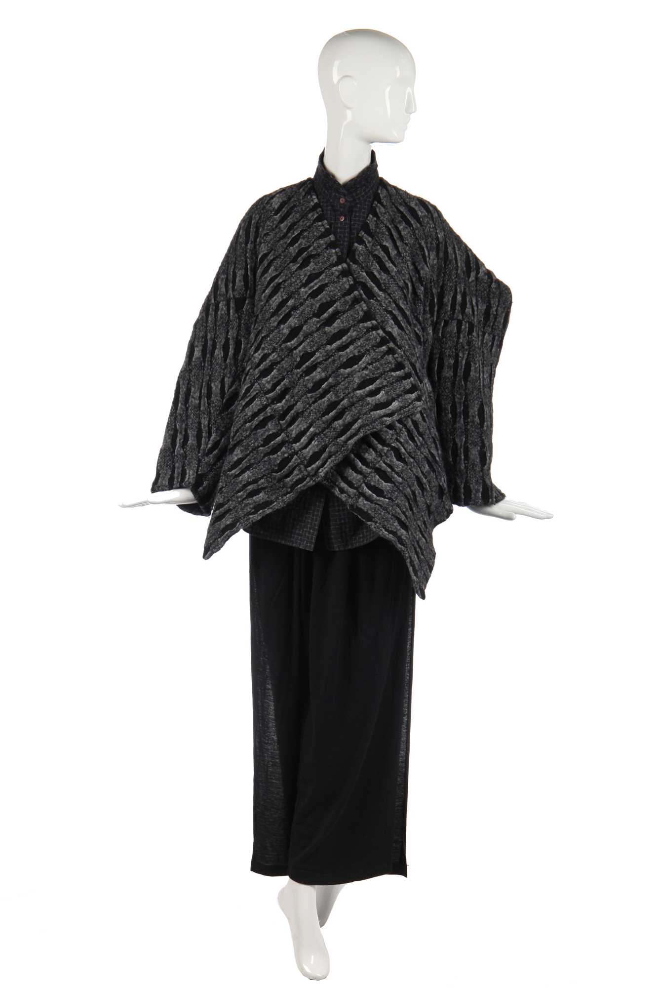 Lot 344 - An Issey Miyake textured wool jacket in