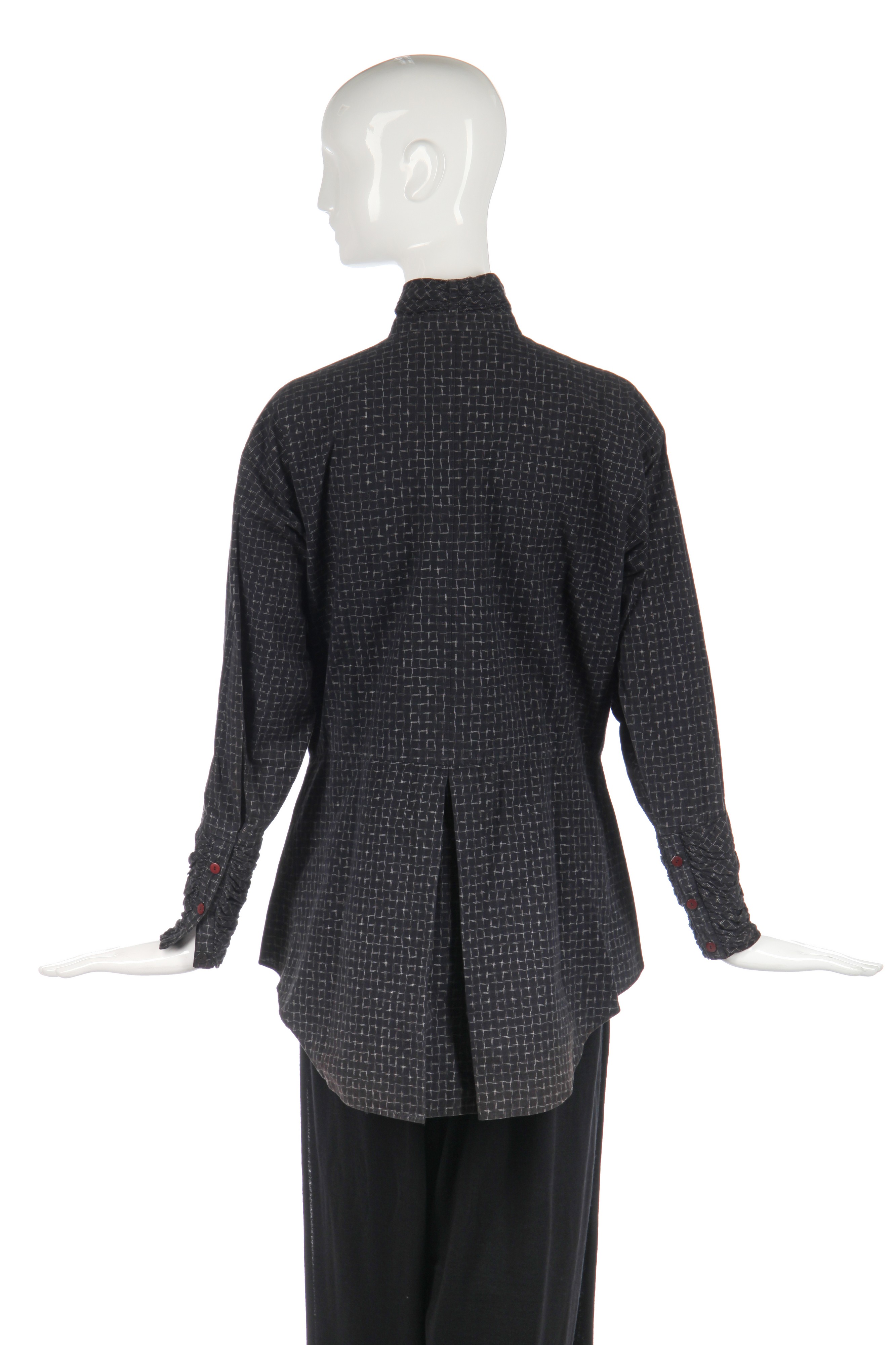 Lot 344 - An Issey Miyake textured wool jacket in