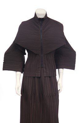 Lot 185 - An Issey Miyake pleated brown polyester two-piece ensemble, Autumn-Winter 1989-90