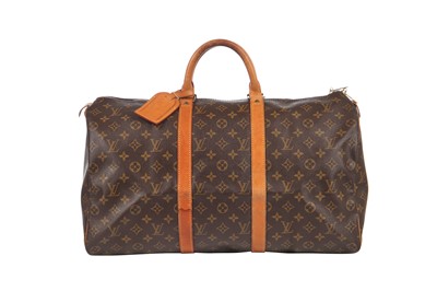 Lot 121 - Two Louis Vuitton monogrammed canvas and leather holdalls, 1990s
