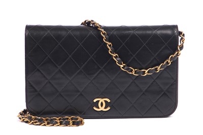 Lot 1 - A Chanel quilted black leather handbag, 1996-97