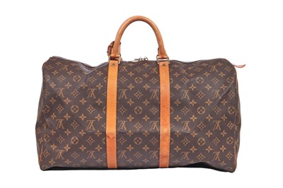 Lot 58 - Three Louis Vuitton monogrammed canvas leather holdalls