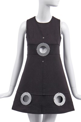 Lot 214 - A Pierre Cardin minidress with three circular cut-outs and metal discs, circa 1969