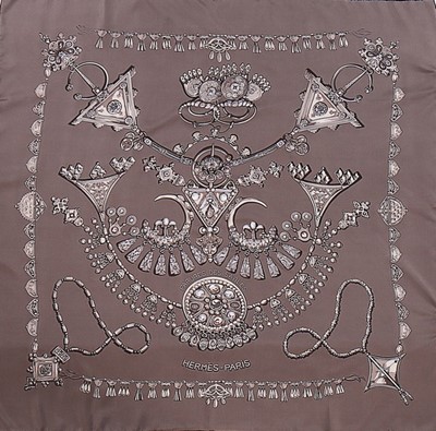 Lot 37 - An Hermès 'Parures des Sables' silk scarf,...