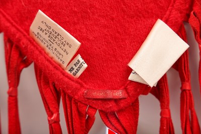Lot 51 - An Hermès red wool and cashmere shawl, probably 1980s
