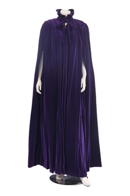 Lot 255 - A Christian Dior London by Marc Bohan purple velvet evening cape, 1980s